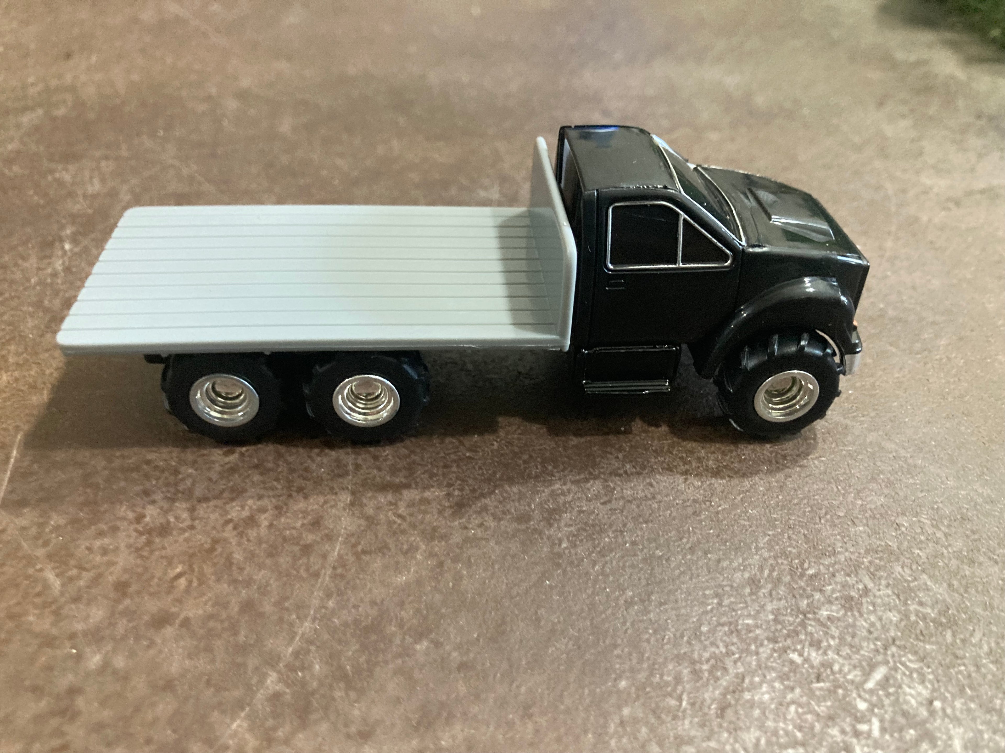 Plastic Ertl Flatbed Truck